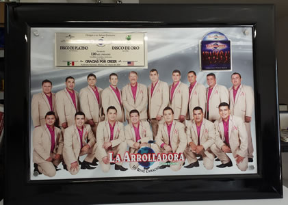 FOTO_ARROLLADORA_disco_de_platino_2014